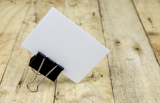 Bank business card on wood table.