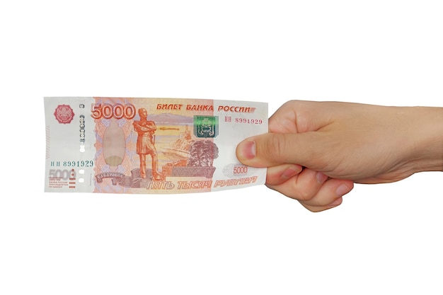 Banknote are in denominations of 5000 rubles in hands