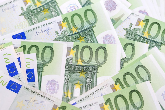 Banknotes of 100 euros as a financial background.