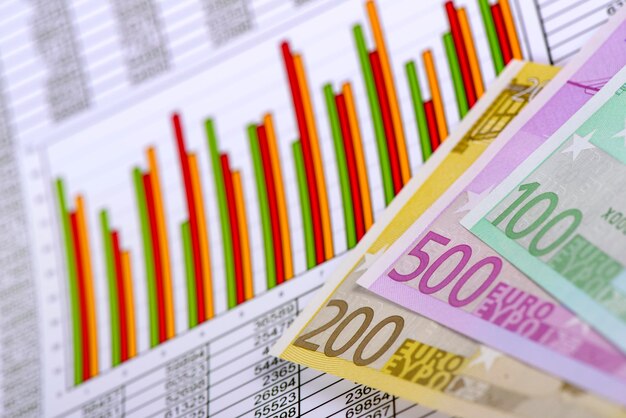 Banknotes of euro currency and chart