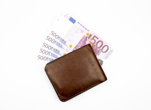 Banknotes and wallet on a white background isolate