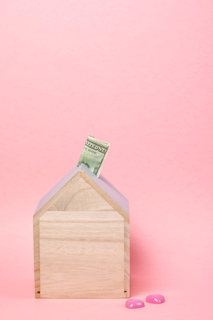 Banknotes in wooden money box