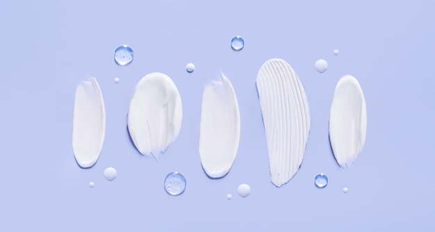 banner cosmetic smears cream texture on pastel background