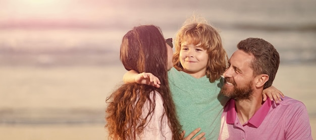 Banner of family embracing on sea beach summer family vacation\
horizontal banner banner of family embracing on sea beach summer\
family vacation horizontal banner