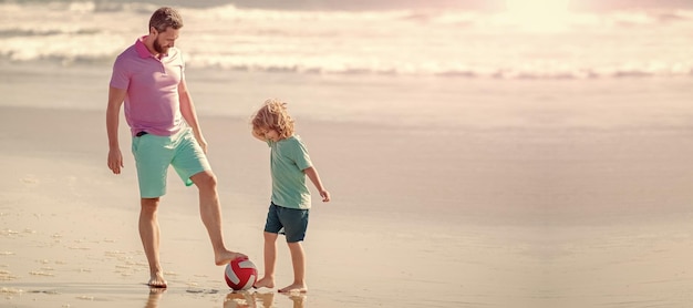 Banner of father and son play soccer or football on beach father and son play football on summer beach with ball football