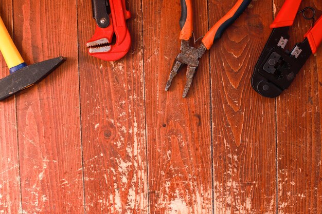 Photo banner flatly building tools on a wooden background construction and repair fathers day builders day