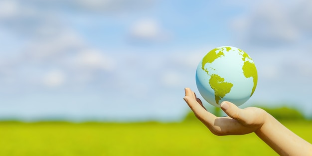 Banner of hand holding planet earth with blurred field in background. climate change concept. 3d rendering