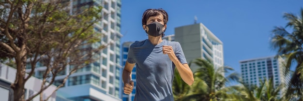 Photo banner long format man runner wearing medical mask running in the city against the backdrop of the