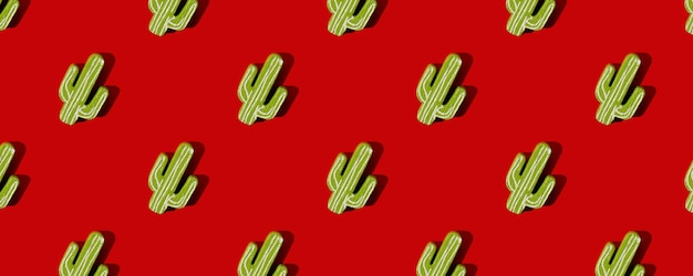 Banner patroon Mexicaanse stijl groene cactus op rode achtergrond bovenaanzicht plat lag
