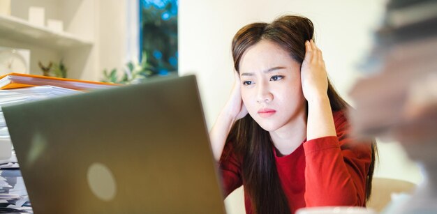 Banner Stressed freelancer checking reports and accounting in computer working overtime