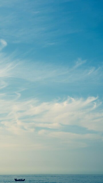 Premium Photo | Banner vertical story atmosphere panorama white cloud clear blue sky horizon line calm empty sea concept paradise life design relax wallpaper background more tone format in stock Premium Photo | Banner vertical story atmosphere panorama white cloud clear blue sky horizon line calm empty sea concept paradise life design relax wallpaper background more tone format in stock