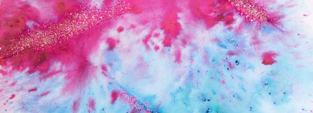 Banner with blue-pink watercolor stains with glitter sequins. Abstract background