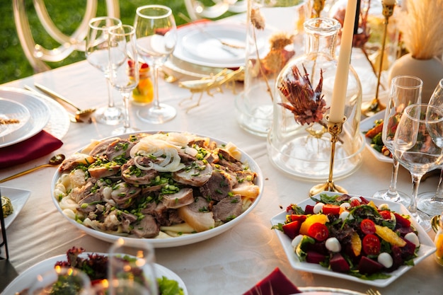 Banquet table with variety of oriental appetizers