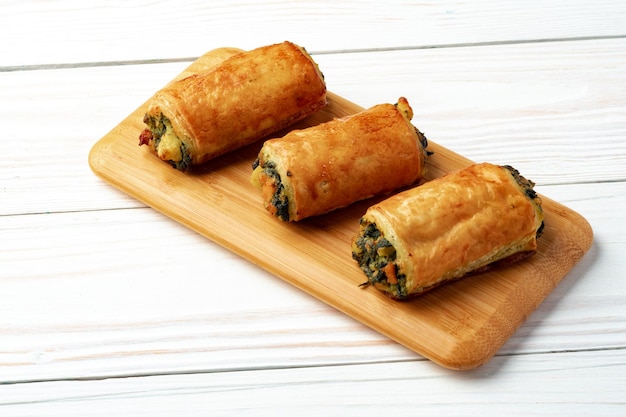 Banquet table with variety of stuffed pies pastry