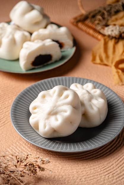 baozi or chinese steamed buns is a type of yeastleavened filled bun in various chinese cuisines