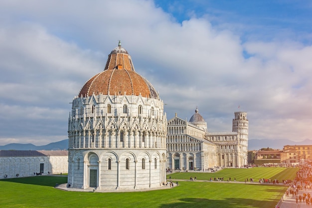 Baptistery Leaning Tower in a sunny day in Pisa Italy