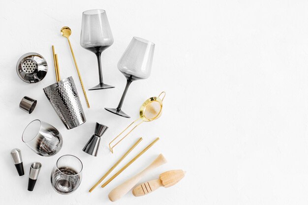 Bar accessories and tools for making cocktail. Shaker, jigger, glass, spoon  and  other bar tools.