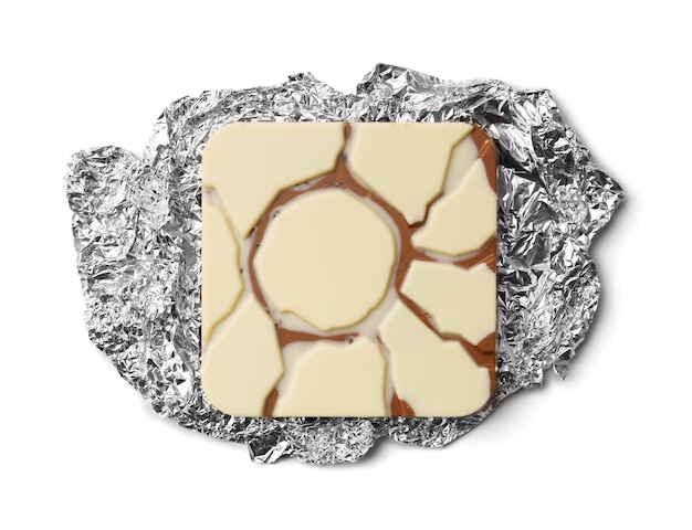 A bar of chocolate in foil on a white background top view