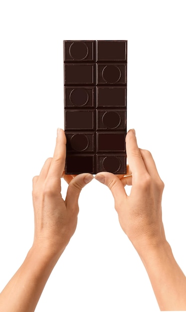 Bar of chocolate in hand on a white background