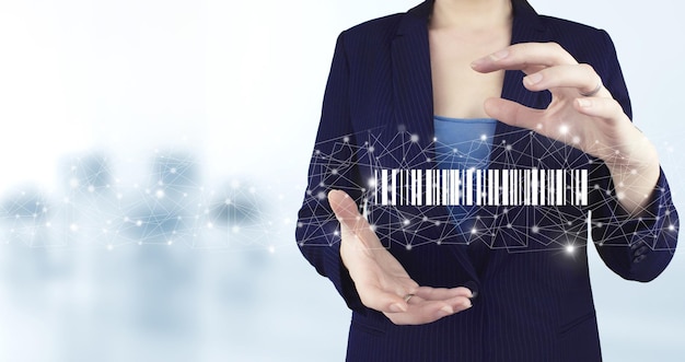 Bar Code Price Tag Merchandise Concept. Two hand holding virtual holographic Bar Code Price Tag icon with light blurred background. Warehouse and logistics.