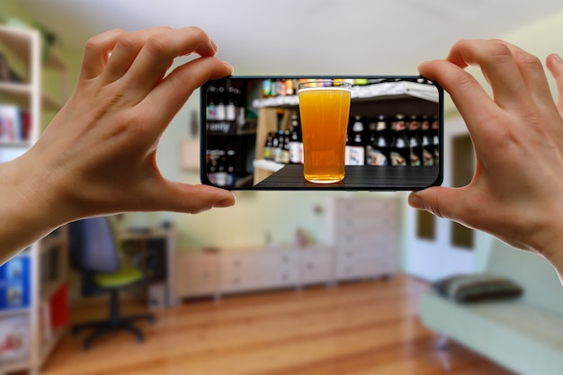 Bar via the internet. Using technologies for online drinking at home with friends.