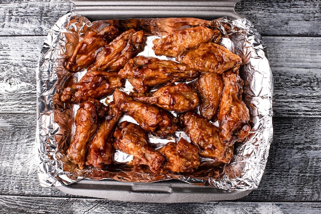 Barbecue chicken wings barbecue wings on a white background for takeaway