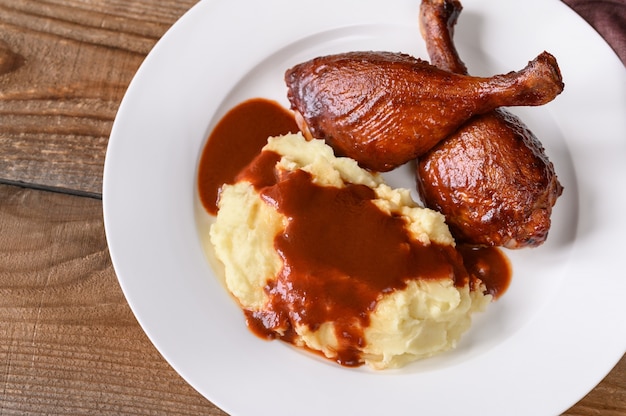 Barbecue duck legs with mashed potato