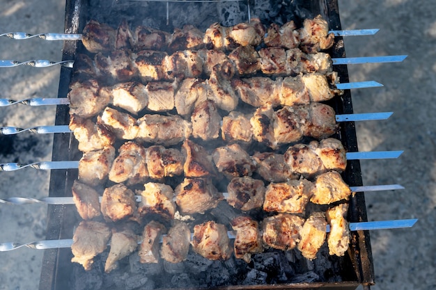 Photo barbecue on the grill. cooking meat on the grill.