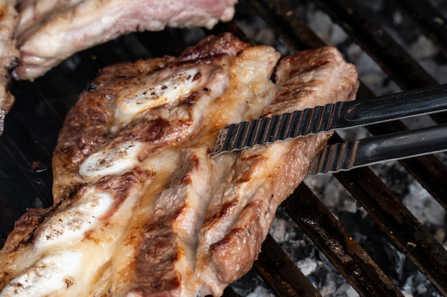 Barbecue grill with grilled pork ribs