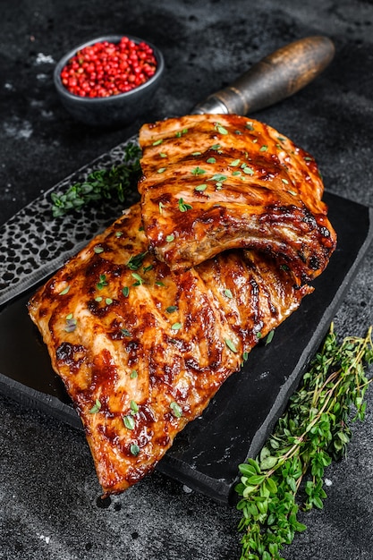 Barbecue pork rack spare ribs on a marble board. 