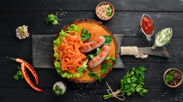 Barbecue Sausages with vegetables Top view Free space for your text