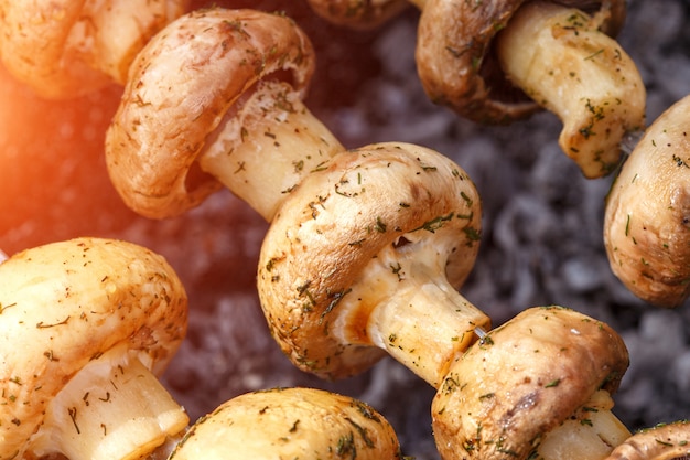 Barbecue skewers with grilled champignon mushroom kebab in a brazier