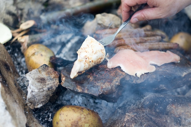 Barbecue on stone in mountains