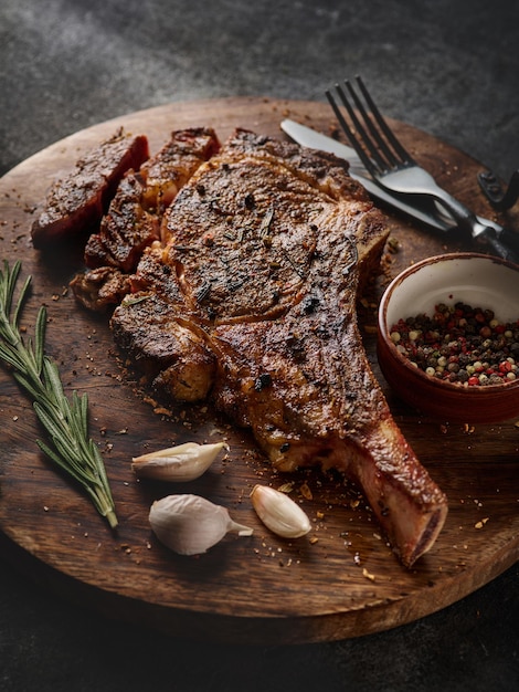 Barbecue Tomahawk Steak on Cutting Board Steak on the bone Succulent grilled tomahawk beef steak