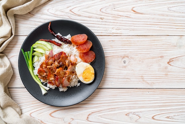 Barbecued red pork in sauce on topped rice