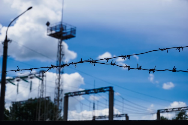 Barbed wire on sky background