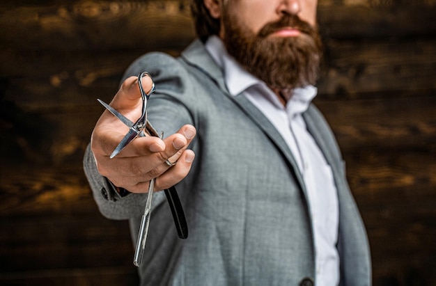 Barber scissors and straight razor barber shop suit Vintage barber shop shaving Portrait bearded man Mustache men Brutal guy scissors straight razor