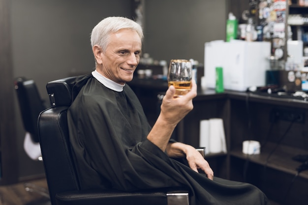 Barbershop Elderly Client Drinks Alcohol