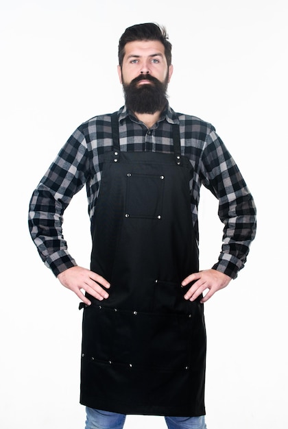 Barbershop staff Beard grooming salon Well groomed macho barber Uniform for barber salon Barbershop concept Hairdresser barber salon for men Man brutal bearded hipster wear apron uniform