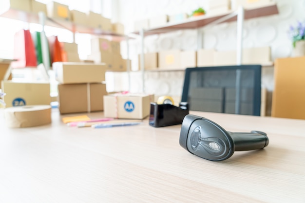 Barcode reader on table of warehouse