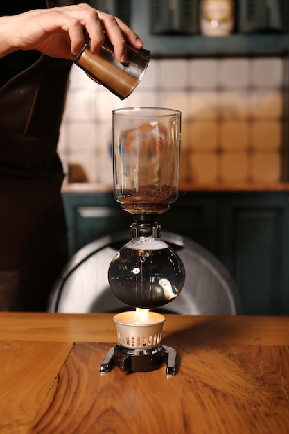 barista brewing coffee in the coffee room