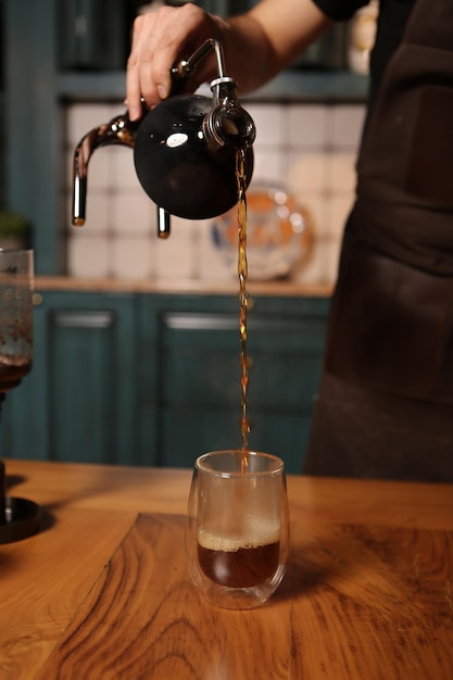 barista brewing coffee in the coffee room