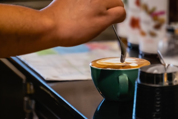 Barista make coffee latte art