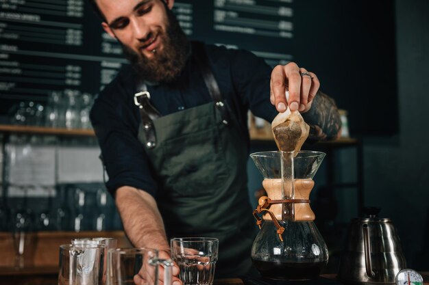 Barista Making Chemex Coffee