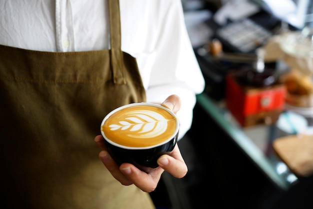 Barista making coffee latte art.    