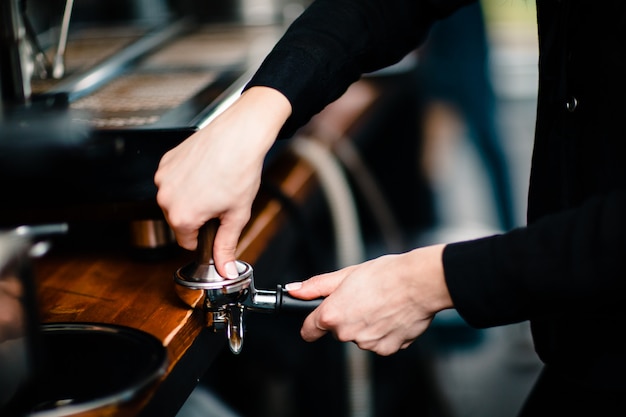 Barista making coffee