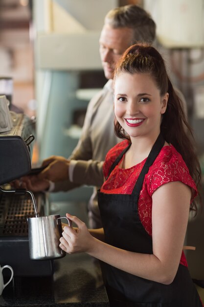 Barista making a cup of coffee