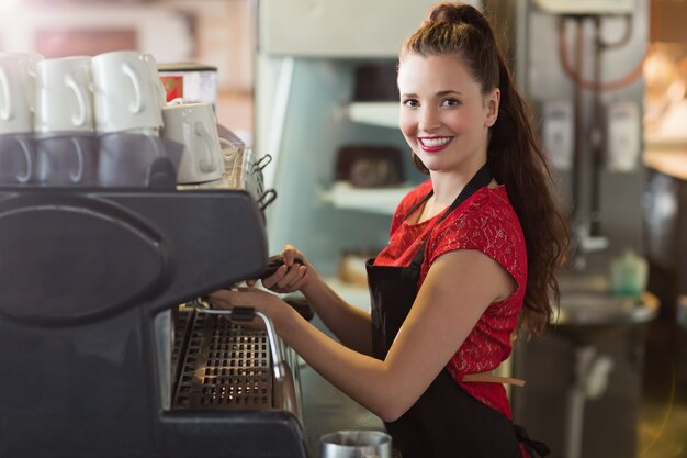 Barista making a cup of coffee