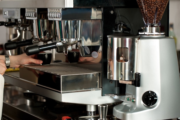 Barista prepares espresso