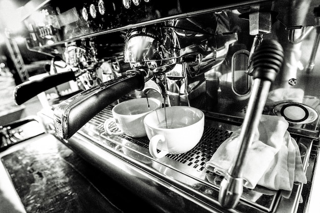 Barista working in a coffee shop Close up